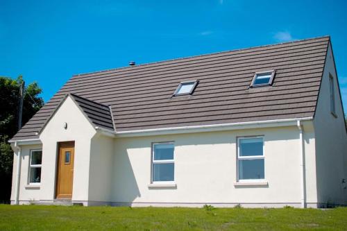 Lettermacaward House | Experience Gweebarra River Views with Oceanfront Amenities