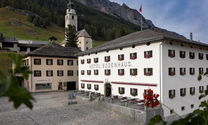 Spluegen Hotel | Discover Hôtel Bodenhaus: Family-Friendly Retreat with Pool