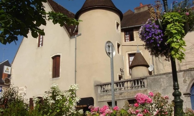 Saint-Amand-Montrond House | Discover Comfort at Hôtel de l'Ecu with Family-Friendly Amenities