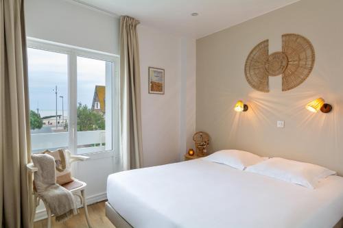 Courseulles-sur-Mer Hotel | Oceanfront Bliss at Hôtel De La Plage - Rated 8/10