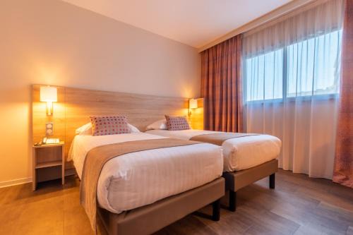 Cros-de-Cagnes Hotel | Discover Comfort at Hôtel L'Empreinte - Pet Friendly Stay