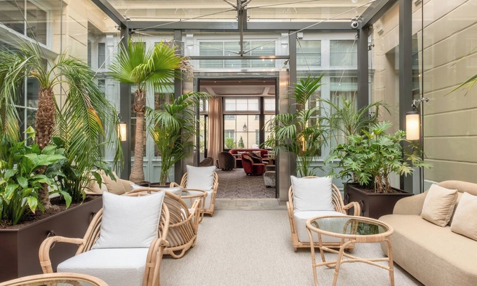 Notre-Dame Hotel | Experience Comfort at Hôtel Les Lumières with Spa & Kitchen