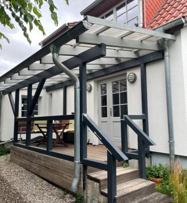 Kloster Apartment | Hügelhus: Beachfront Retreat with Ocean Views & Family Fun