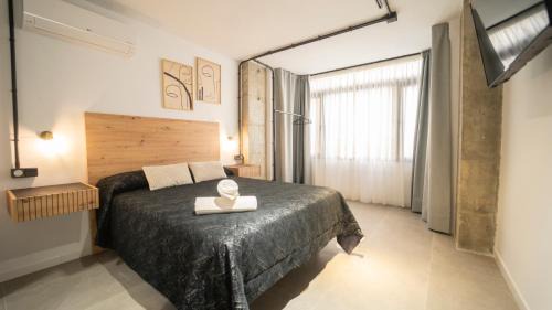 San Ildefonso Apartment | Family-Friendly H&H Suite Oasis in Scenic Granada