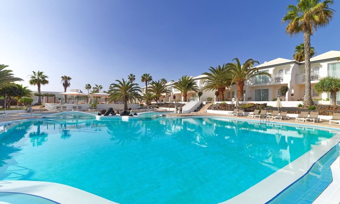 Corralejo Resort | Explore H10 Ocean Suites: Family-Friendly with Spa & Pool