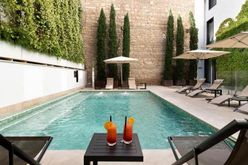 Cordoba Old City Hotel | Relax at H10 Palacio Colomera: Family-Friendly Retreat