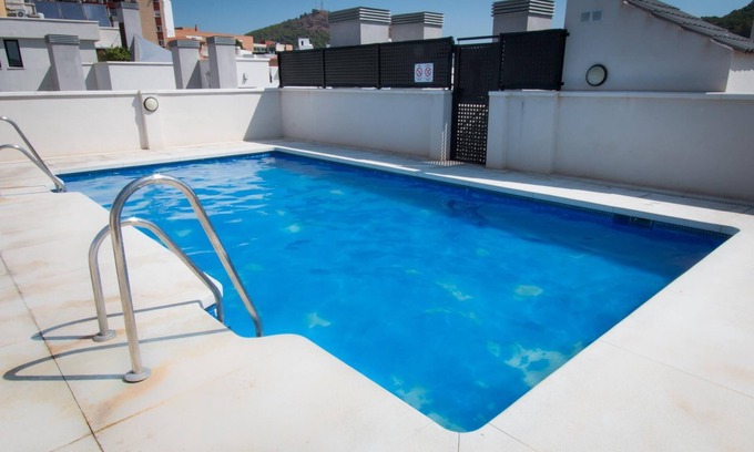 El Ejido Apartment | Refino 2-Bedroom Apartment with Pool in City Center