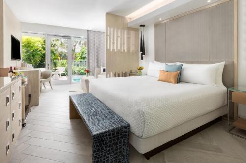 Uptown - Upper Duval Resort | Elegant H2O Suites for Adults: Poolside Oceanfront Retreat