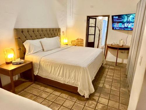 Esterito House | Prime Location: Room Steps from the Malecón with Ocean View