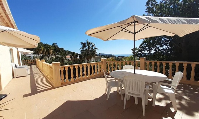 Pinar del Advocat Apartment | Cozy Room with Sloped Ceiling and Ocean View