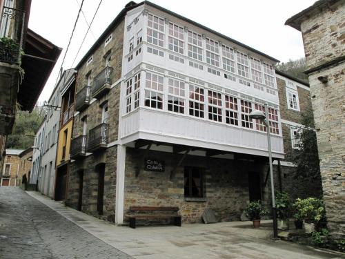 Navia de Suarna Apartment | Quadruple Room with Barbecue and Patio for Your Family Getaway