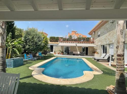 San Vicente del Raspeig House | Inviting Poolside Suite with Ocean Views & Top Guest Rating