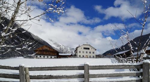 Rasun Anterselva Apartment | Discover Halbwöhrerhof: Family-Friendly Retreat Rated 9.9