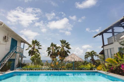 Bacolet Hotel | Half Moon Blue Hotel: Private Beach & Oceanfront Pool Access