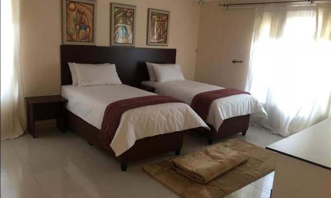 Gaborone House | Budget-Friendly Hall's Home with 8.7/10 Guest Rating
