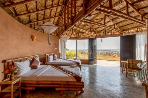 Stueng Trang Resort | Family-Friendly Hanchey Bamboo Resort with Pool & Dining
