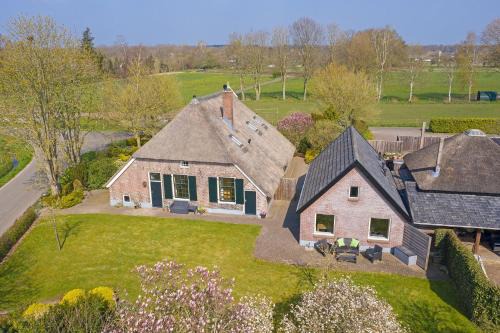Municipality of Epe Apartment | Hanendorper Hoeve: Guesthouse with Oceanfront Spa Retreat