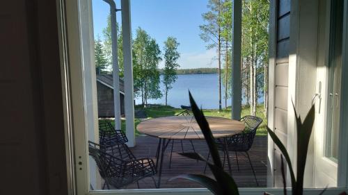 Taivalkoski House | Experience Oceanfront Comfort at Hanhi Linna Hotel