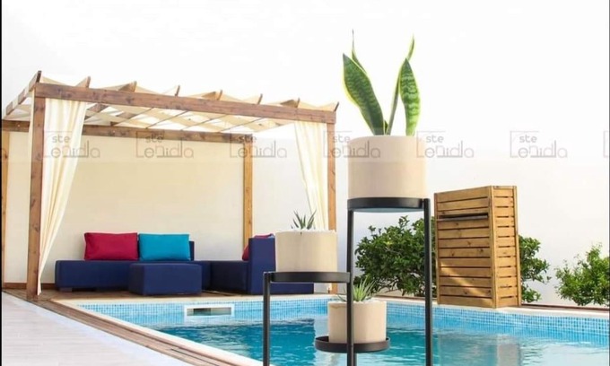 Ras Jebel House | Inviting Ness Hotel: Family-Friendly with Pool & Fireplace