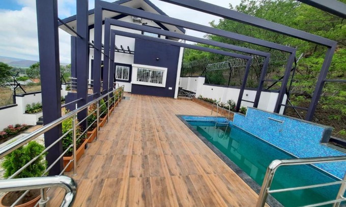 Ambavna Villa | Happy Hours: Family-Friendly Retreat with Pool Access