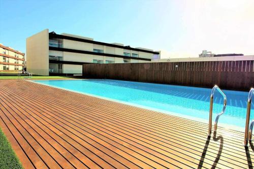 Fao Apartment | Enchanting Happy House: 4-Star Haven with Pool & Spa