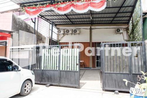 West Semarang House | Budget-Friendly Stay at Happy Inn Puspo Mitra RedDoorz