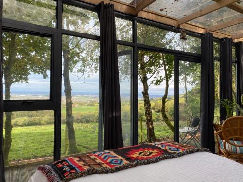 Brittas House | Cozy Happy Land Cabins with Hot Tub & Pet-Friendly Perks