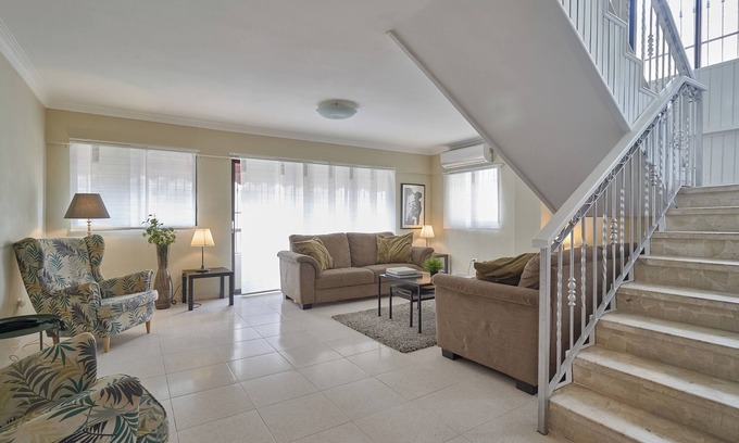 Ensanche Quisqueya Apartment | Elegant Harmony Penthouse Near Acropolis with Ocean Views