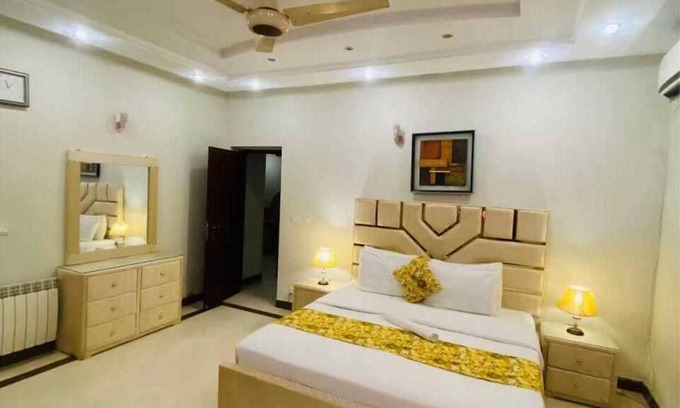 E-11 Sector House | Inviting Harveys Guest House: Family-Friendly with Pool