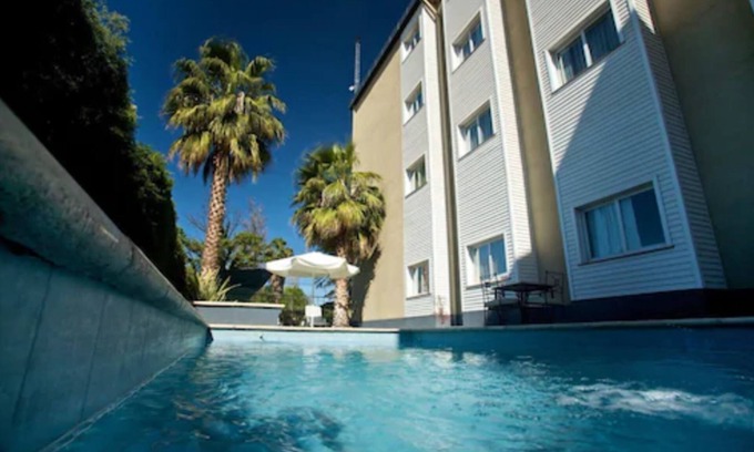 Guaymallen Hotel | Inviting Hathor Hotels Mendoza with Pool and Spa Amenities