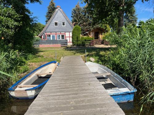 Wanzka House | Idyllic Lakeside Retreat with Boat, Sauna & Scenic Views