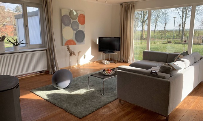 Busumer Deichhausen House | Ocean View Retreat at Haus am Strandweg - 9.4/10 Rated