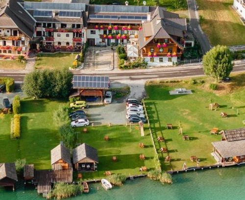Weissensee House | Elegant Haus Binter: Oceanfront Retreat with Private Beach