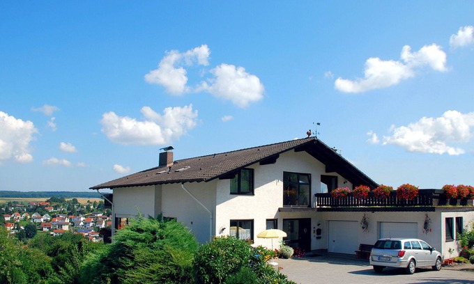 Bad Konig Apartment | Tranquil Haus Fernblick: Spa, Pool & Perfect Reviews Await