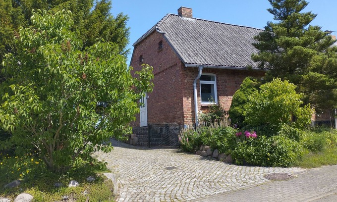 Am Salzhaff House | Discover Haus Seegang: Beachside Retreat with Garden Oasis