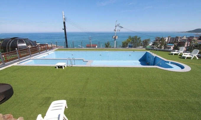 Yeongdeok Apartment | Discover Hayanjip: Family-Friendly Pension with Pool & Kitchen