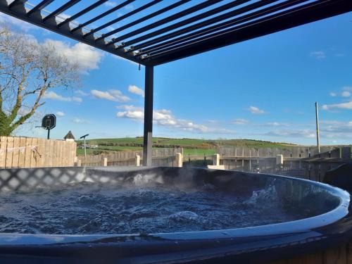 Loughinisland House | HAYLOFT: Relax in a Hot Tub with Ocean Views