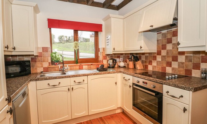 Watchet Cottage | Pet-Friendly Hazel Lodge with Spa and Hot Tub in Washford