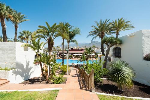 El Madronal Hotel | Discover HD Parque Cristobal Tenerife with Oceanfront Views