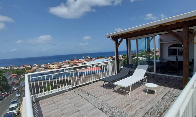 Basse-Terre House | Elevate Your Stay at Head in the Clouds 971 with Kitchen