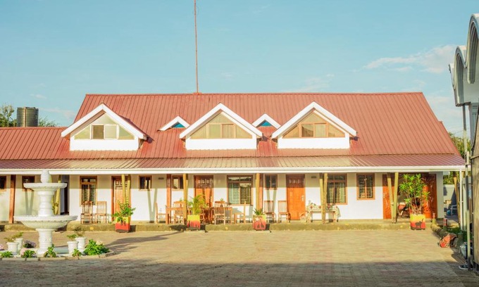Arusha Hotel | Discover Heart of Africa Lodge: Pet-Friendly Retreat with Pool