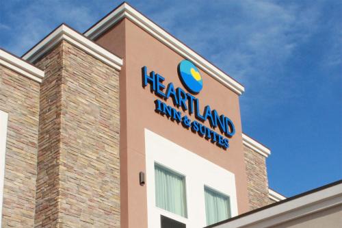 Wheatland Hotel | Welcoming Heartland Inn and Suites with Pool & Hot Tub