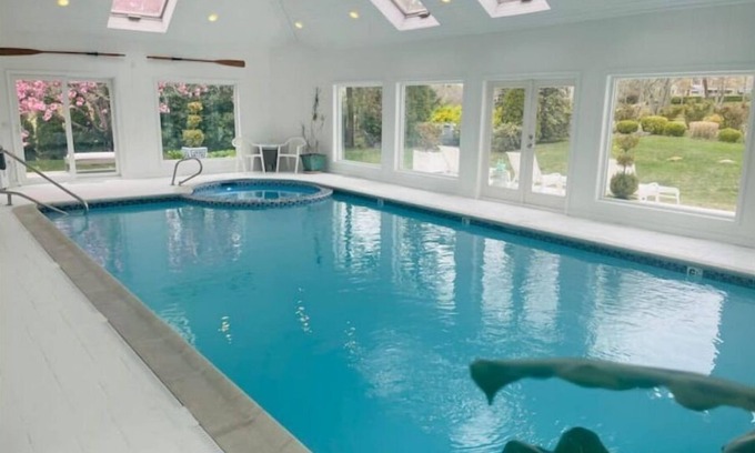 Mashpee Villa | Indulge in Relaxation: Indoor Pool & Spa with Golf Views