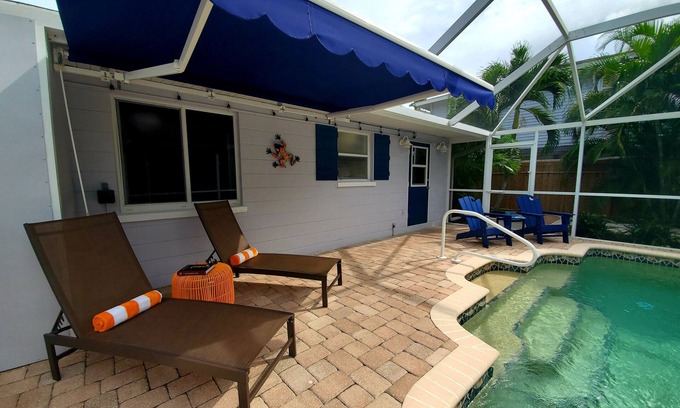 Englewood House | Experience Outdoor Fun with Heated Pool & Tiki Bar!