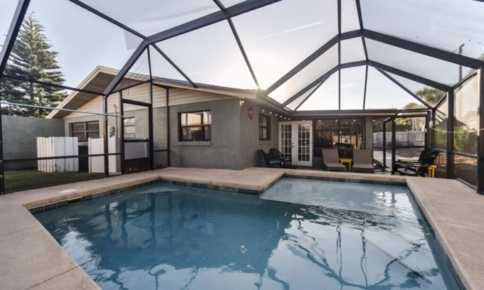 Beau Rivage Shores House | Family-Friendly Retreat with Heated Pool Steps from the Beach
