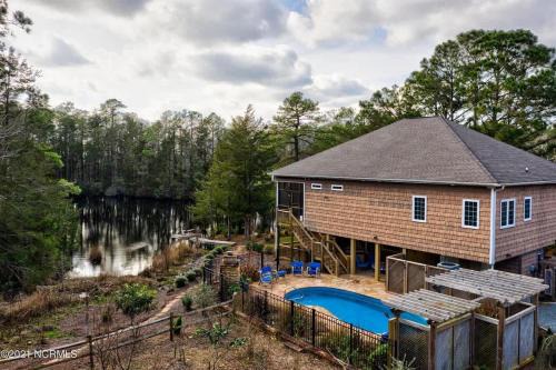 Myrtle Grove House | Idyllic Retreat with Private Pool & Pond Views Near Beach