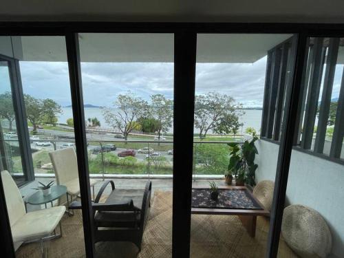 Likas Apartment | Oceanfront Bliss: Heaven in the City Beach Condo