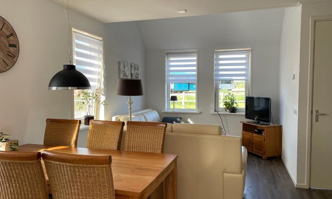 Buitenpost Apartment | Inviting Corner Apartment with Ocean View Near the Village