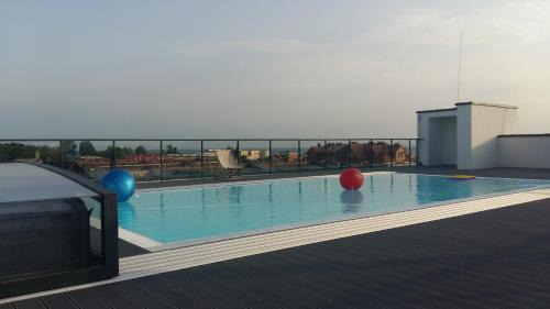 Hel Apartment | Hel Amber Apart: Oceanfront Retreat with Pool & Pet Friendly