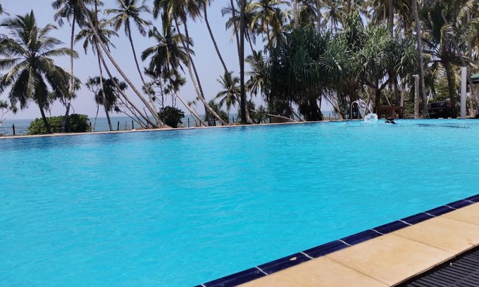 Ranna Hotel | Pet-Friendly Helios Beach Resort with Oceanfront Views